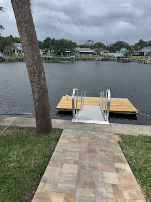 New pavers lead you from the house to the floating dock.