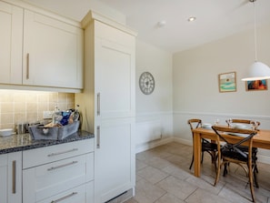 Kitchen/diner | Swinney Cottage - Doxford Cottages, Doxford, near Embleton