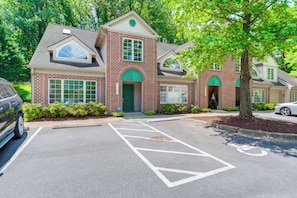 Condo Exterior | Parking | Community Lot (2 Vehicles)