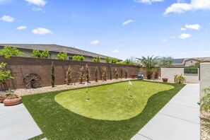 Mini Putting Green – Sharpen your short game steps away from the patio.