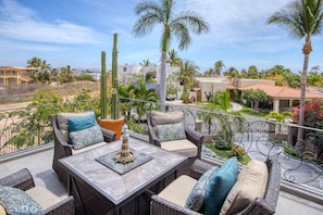 Spacious terrace offering comfortable seating and scenic views, perfect for outdoor gatherings and quiet moments.