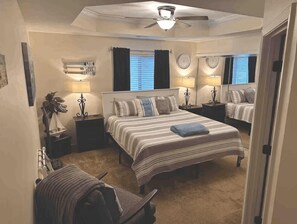 Comfort meets simplicity in this stylish studio—featuring a queen bed and cozy atmosphere.