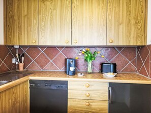 Wood, Kitchen, Flooring, Countertop, Orange, Cabinetry, Wood Stain, Kitchen Appliance, Major Appliance, Hardwood