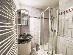 Interior Design, Floor, Flooring, Plumbing Fixture, Room, Plumbing, Bathroom, Apartment, Sink, Bed