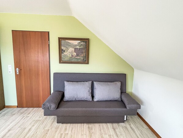 Furniture, Wood, Flooring, Interior Design, Floor, Couch, Room, Wood Flooring, Home, Living Room