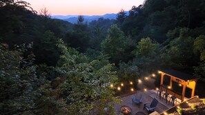 Cozy nights at the lower level fire pit and bar w/ outdoor TV