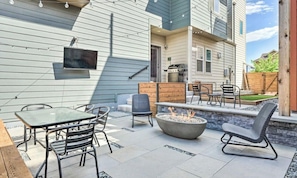 Side Yard with Outdoor Dining, Grill, TV, and Fire Pit