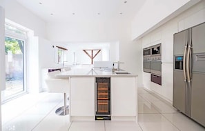 Kitchen with doors to rear garden
