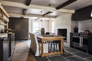 Eat in kitchen with wood burning fireplace