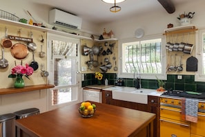 The aircon in the kitchen is not original, but definitely comes in handy.