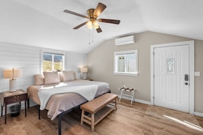 The peaceful bedroom has a comfortable king bed.