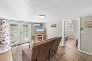There is a Smart TV and a built-in electric fireplace.