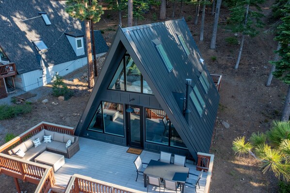 An iconic modern A-Frame with a commanding view of the Lake.