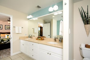 CVW-305 Double vanity bathroom with spacious layout and warm finishes