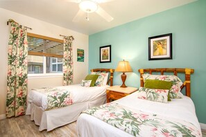 CVW-305 Twin bed setup with playful prints and breezy island style