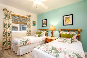CVW-305 Twin bed setup with playful prints and breezy island style