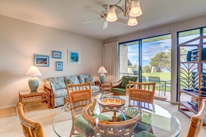 NAP-B43 Gather with loved ones around the stylish dining set, perfectly placed beside large windows that invite in natural light and island views.