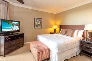 HKH-423 Relax in this inviting suite with king bed, flat-screen TV, warm lighting, and stylish island-inspired furniture