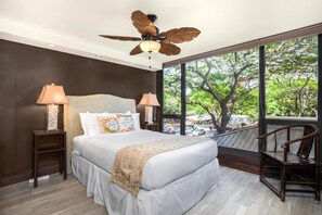 MAH-301 Tucked beneath a canopy of jungle green, this queen-sized bed offers royal comfort amid treetop whispers   : Master Bedroom