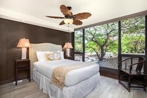 MAH-301 Tucked beneath a canopy of jungle green, this queen-sized bed offers royal comfort amid treetop whispers : Master Bedroom