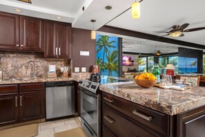 MAH-301   This kitchen gleams like a well-polished secret, where stainless steel appliances flirt with rich cherrywood charm