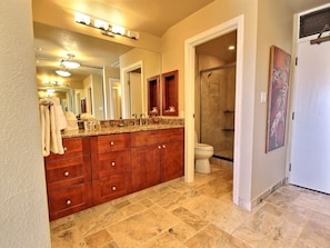 KGV-19P3 Begin your day with a mirror-lit smile and end it in soothing stone and warm wood?this bathroom completes the story of rest