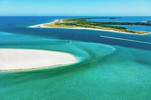 Paradise awaits with sun-soaked beaches and sugar-white sand less than 6 miles away...