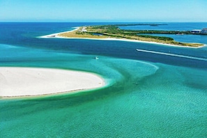 Paradise awaits with sun-soaked beaches and sugar-white sand less than 6 miles away...