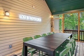 Enjoy breezy evenings on the screened back porch, complete with a BBQ grill and outdoor dining—perfect for family meals, cookouts, or just soaking up the fresh mountain air.