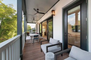 Beautiful outdoor porch for lounging and dining! 