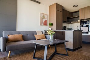 Chic and cozy living space with modern amenities and stylish decor, perfect for a relaxing getaway.
