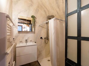 Wall, Plumbing Fixture, Flooring, Interior Design, Bathroom, Floor, Plumbing, Lighting, Toilet, Room