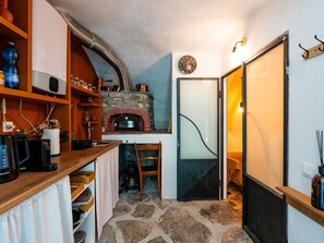Interior Design, Furniture, Ceiling, Lighting, Room, Countertop, Kitchen, Light Fixture, Wood Stain, Chair