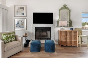Cozy Fireplace, great TV.