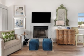 Cozy Fireplace, great TV.