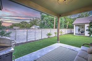 Back patio with outdoor seating and grill 