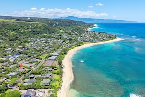 Breathtaking aerial sweep of Oʻahu’s North Shore—just beyond your private escape.