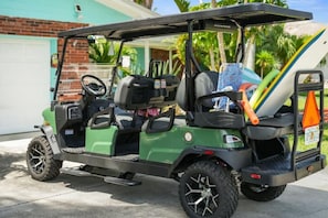 Take the fun golf cart to the beach or to a tiki bar. No fees required.