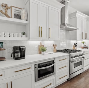 Kitchen is fully stocked with all your cooking essentials! Perfect for cooking together.
