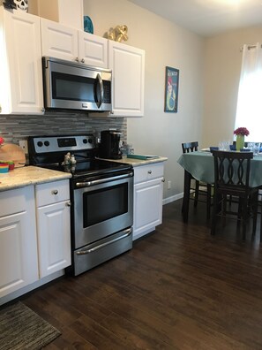Full kitchen- dishes stocked-Keueig pod coffee maker- coffee/sugar/sweeteners/cr