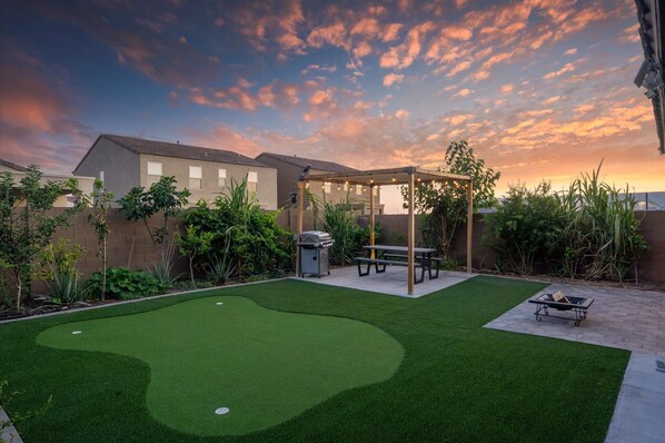 Our backyard comes alive at night—twinkling lights, cozy vibes, and the perfect spot to unwind under the stars.