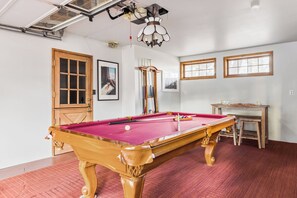 Game room complete with a billiards table. (Gambler)