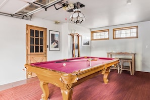 Game room complete with a billiards table. (Gambler)
