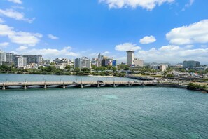 Experience breathtaking panoramic views of the shimmering Condado Lagoon and the vibrant San Juan skyline, a true feast for the eyes.