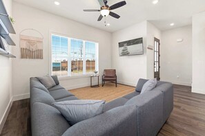  When you walk in our home you will find our open concept living room, kitchen, and dining space that creates the perfect space for memorable gatherings.