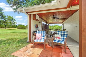 Enjoy company and the Hill Country landscape from the covered patio