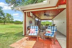 Enjoy company and the Hill Country landscape from the covered patio