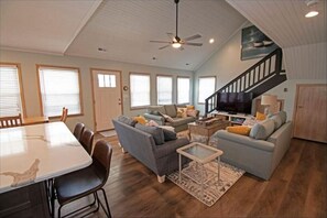 Lower level kitchen connects to den and 2 bedroom main suites.