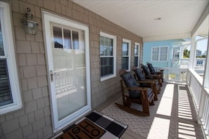 Front Porch overlooking divided side street. Morning shade. Afternoon sunsets.