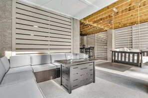 Head downstairs to the lower-level patio & unwind in the fresh air